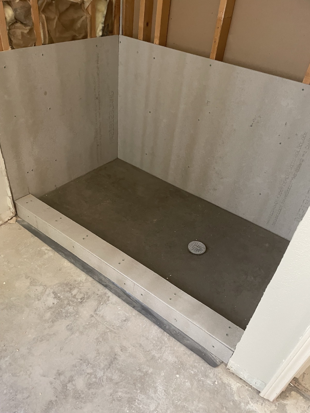 New shower pan and cement backer board during the rebuild